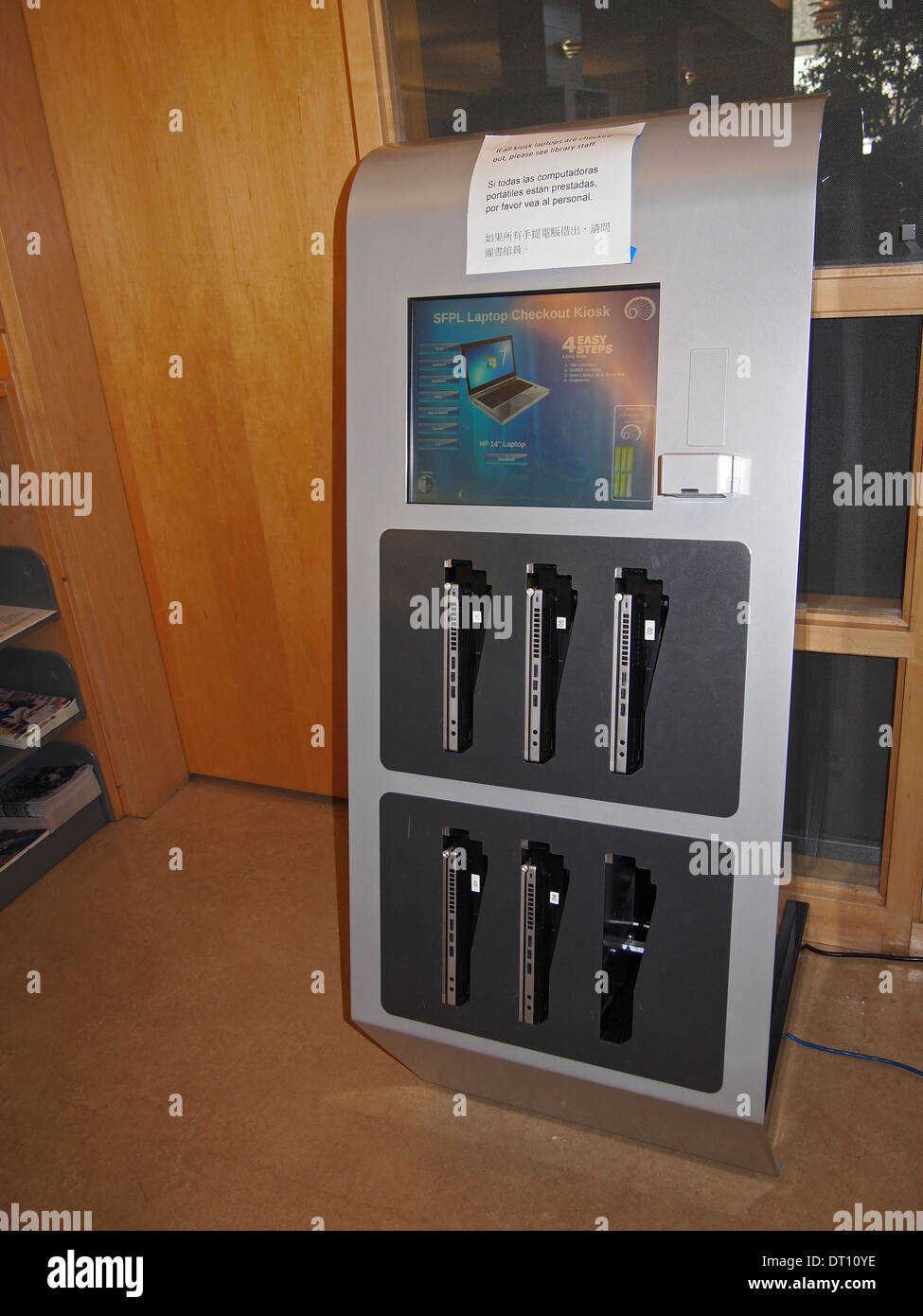 Libreria laptop computer check out chiosco Foto Stock