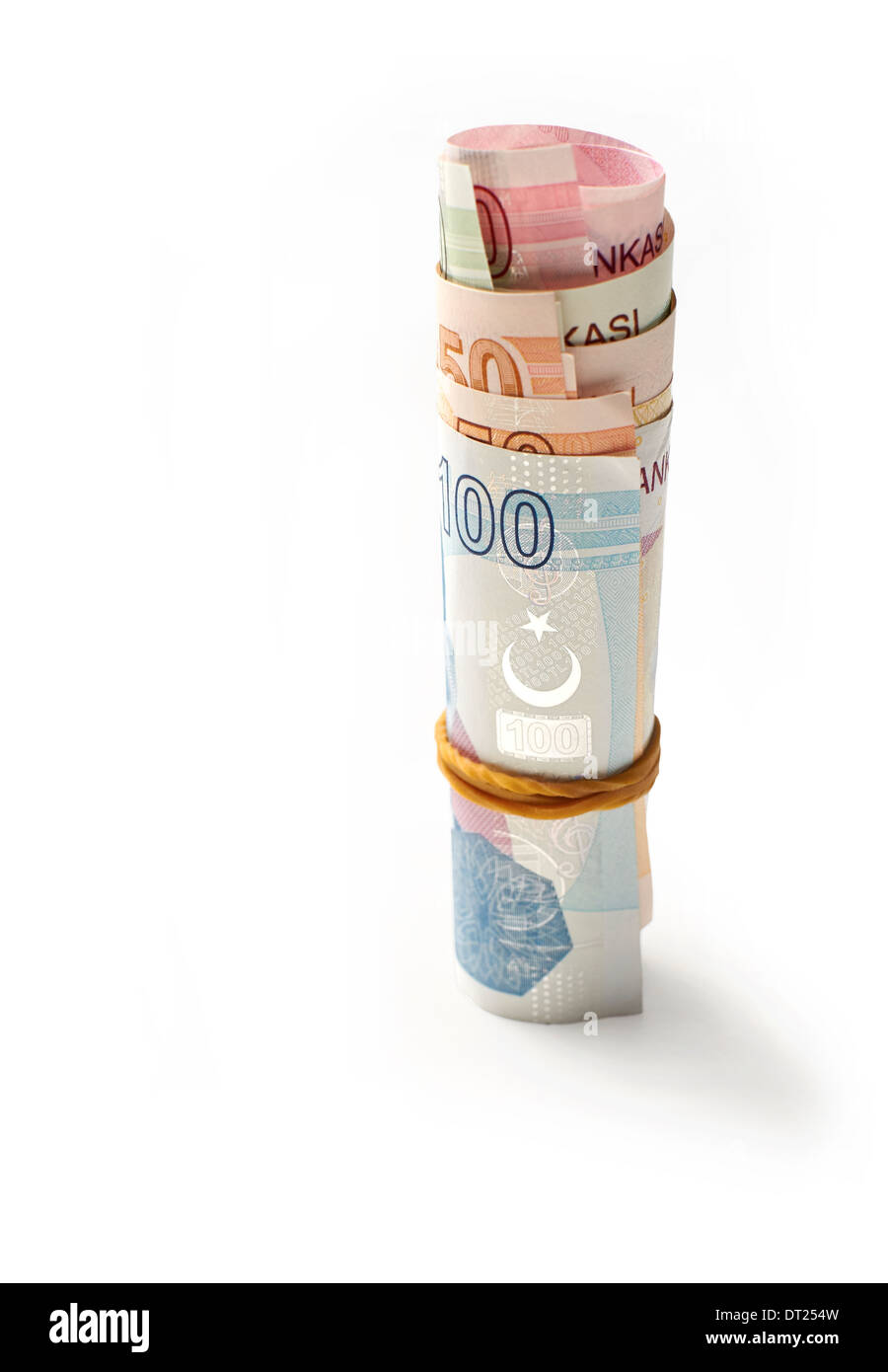 Un rotolo di Lira turca valuta, su uno sfondo bianco. Foto Stock