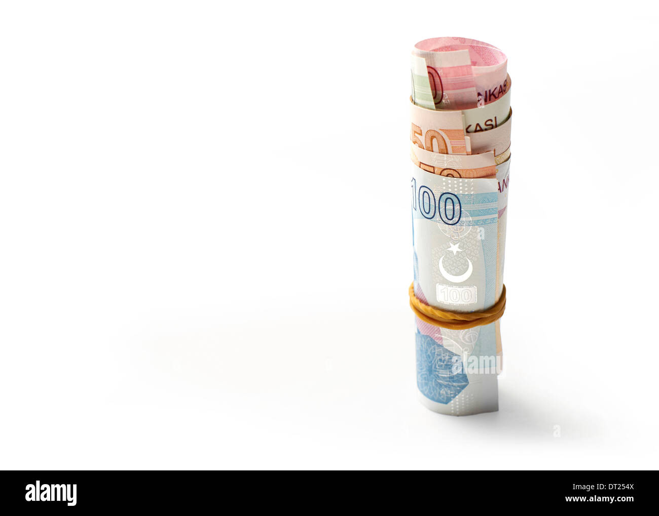 Un rotolo di Lira turca valuta, su uno sfondo bianco. Foto Stock