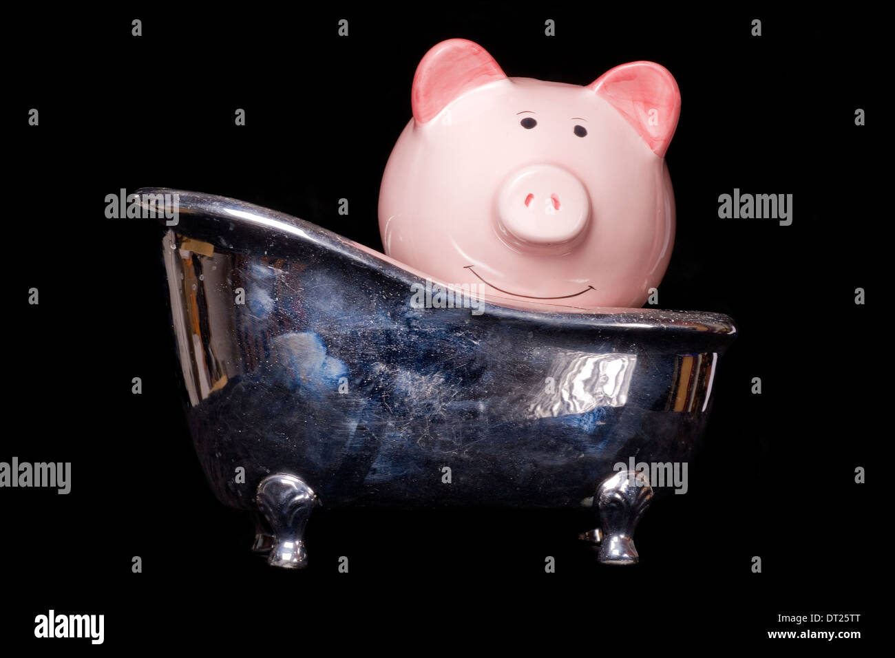 Il denaro sporco salvadanaio intaglio Foto Stock