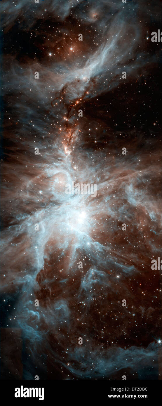 Colonia di caldo, giovani stelle in Orion ne è agitazione fino la scena cosmica in questa immagine dalla NASA il telescopio spaziale Spitzer. Foto Stock