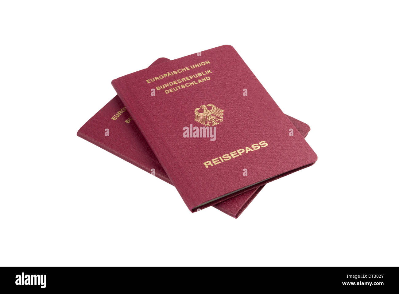 Due passaporti tedeschi isolati su sfondo bianco Foto Stock