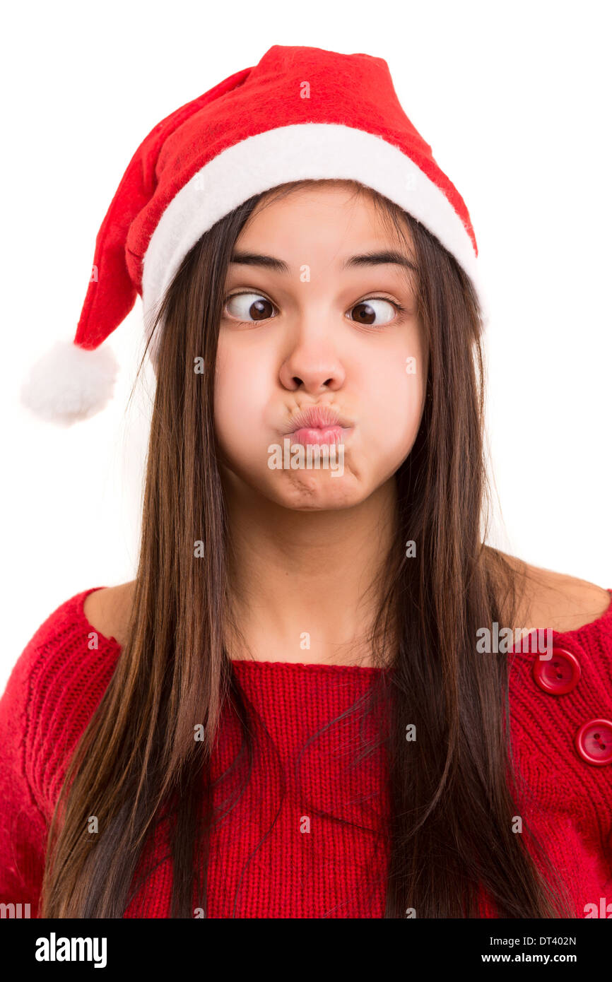 Una bella donna asiatica con un cappello di Natale facendo una stupida espressione Foto Stock