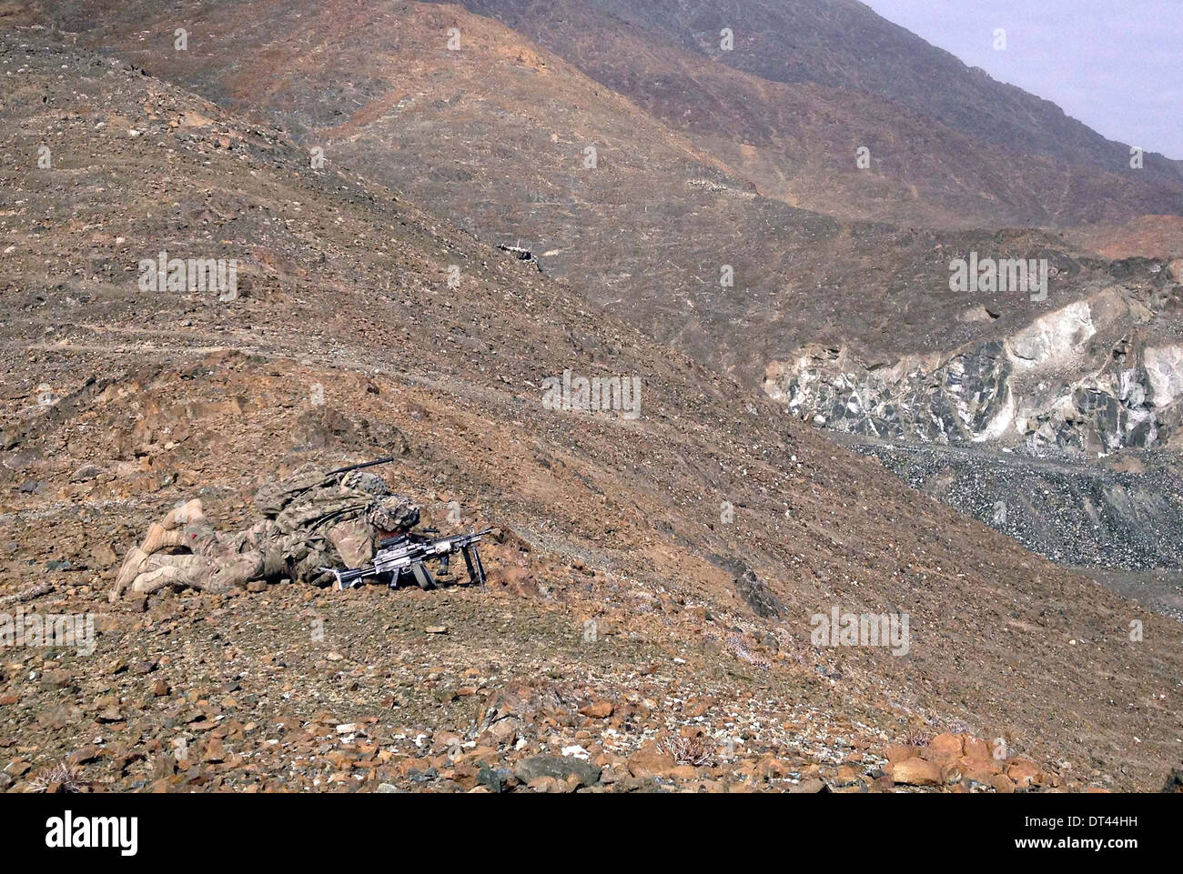 I soldati USA a partire dal decimo Montagna divisione di pattuglia in terreni accidentati 23 gennaio 2014 nei pressi del villaggio di Mohammad Agah nella provincia di Logar, Afghanistan. Foto Stock