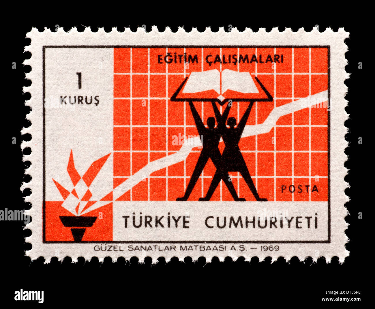 Francobollo dalla Turchia raffigurante un uomo e una donna con un libro in mano, rilasciati per promuovere i progressi educativi. Foto Stock