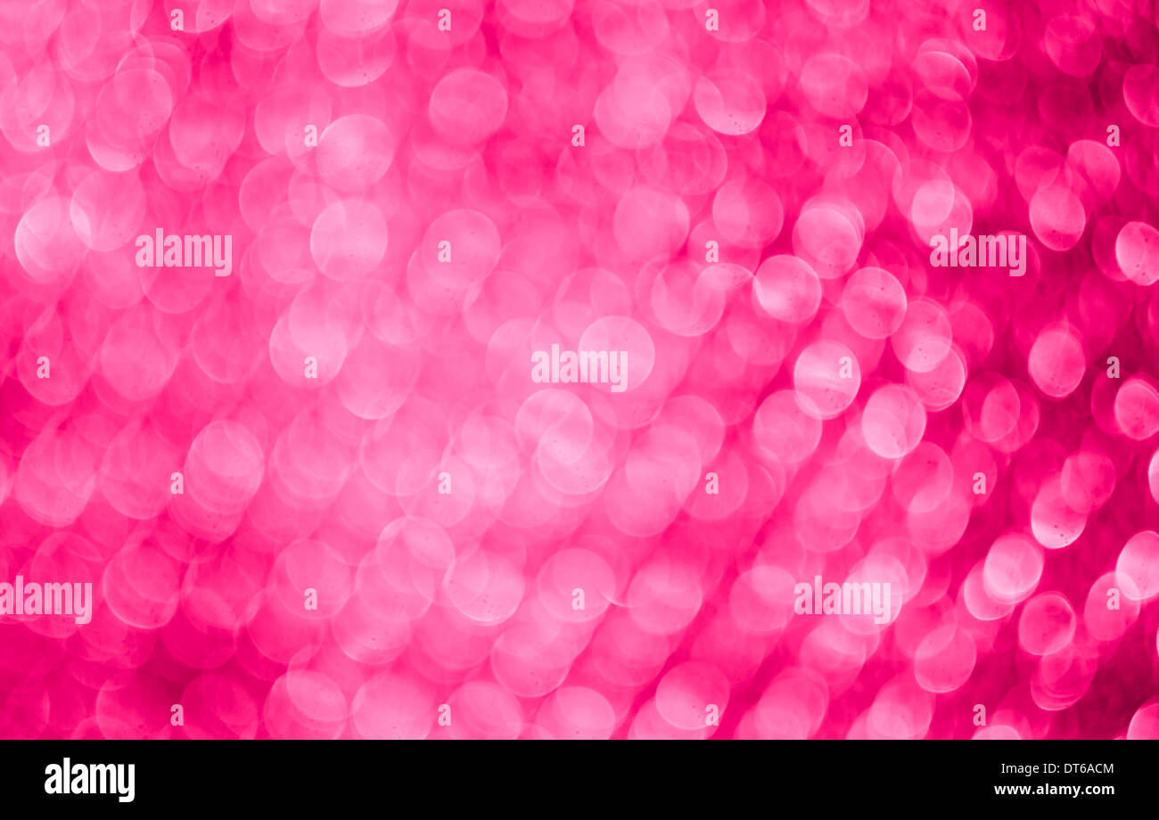 Sfondo bokeh di fondo con il colore rosa vacanze luci di sfocatura Foto Stock