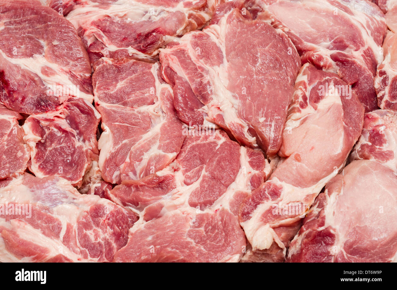Pezzi di fresco succosa carne cruda, sfondo Foto Stock
