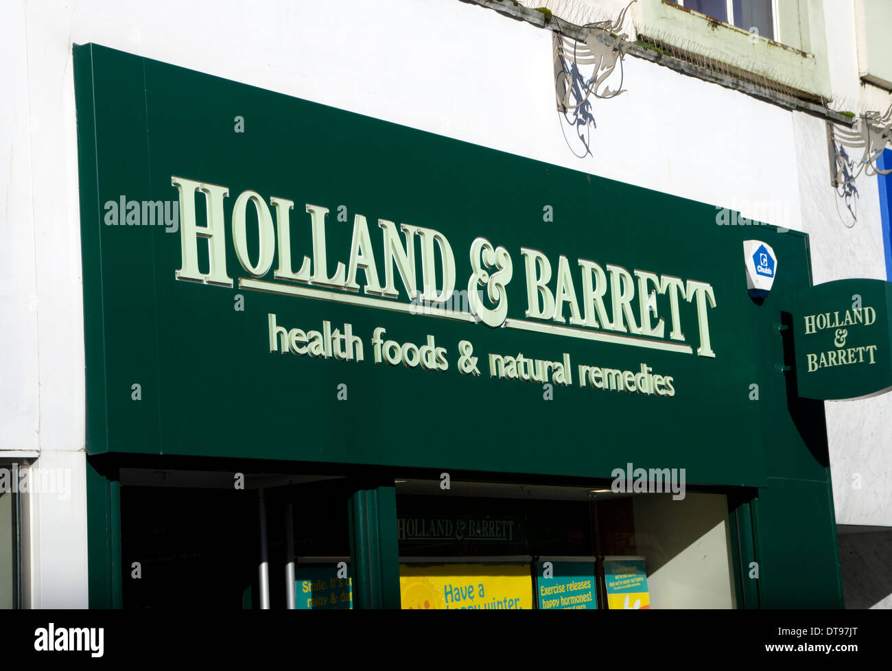 Holland e Barrett health food shop, Queen Street, Cardiff, Galles. Foto Stock