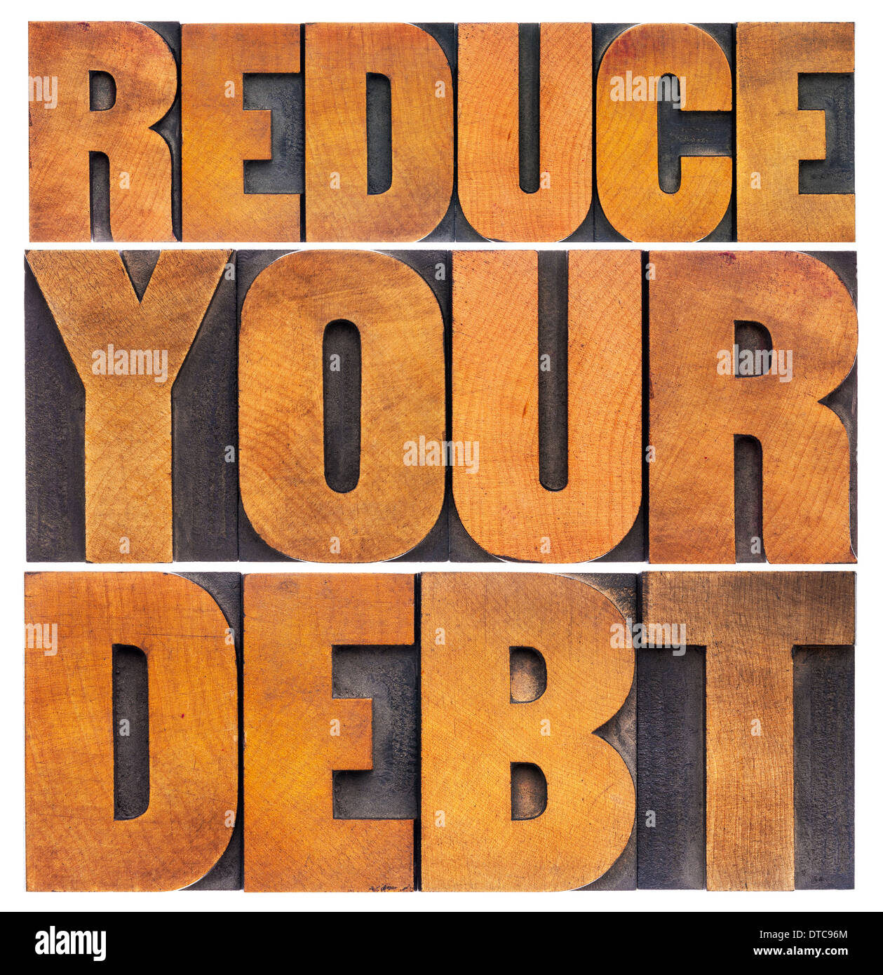 Ridurre il debito finanziario - Nozione - testo isolato in rilievografia vintage tipo legno Foto Stock