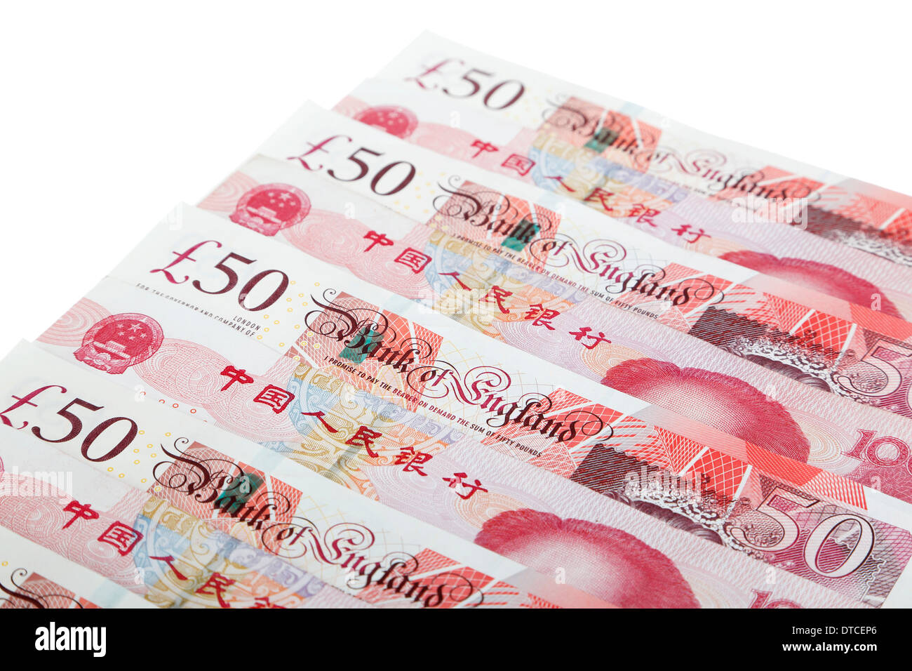 Valuta britannica e la valuta cinese su sfondo bianco Foto Stock