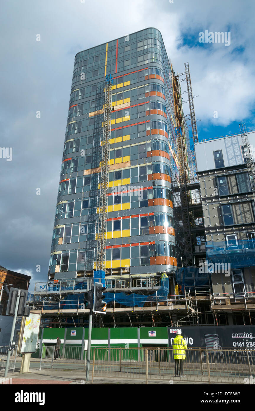 Il nuovo blocco di appartamenti in costruzione (in precedenza chiamato Sarah punto). Grande Ancoats Street, Manchester, Inghilterra, Regno Unito. Foto Stock