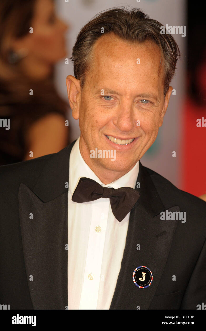 Londra, UK, 16/02/2014 : tappeto rosso arrivi presso l'EE British Academy Film Awards. Persone nella foto: Richard E. Grant. Foto di Julie Edwards Foto Stock