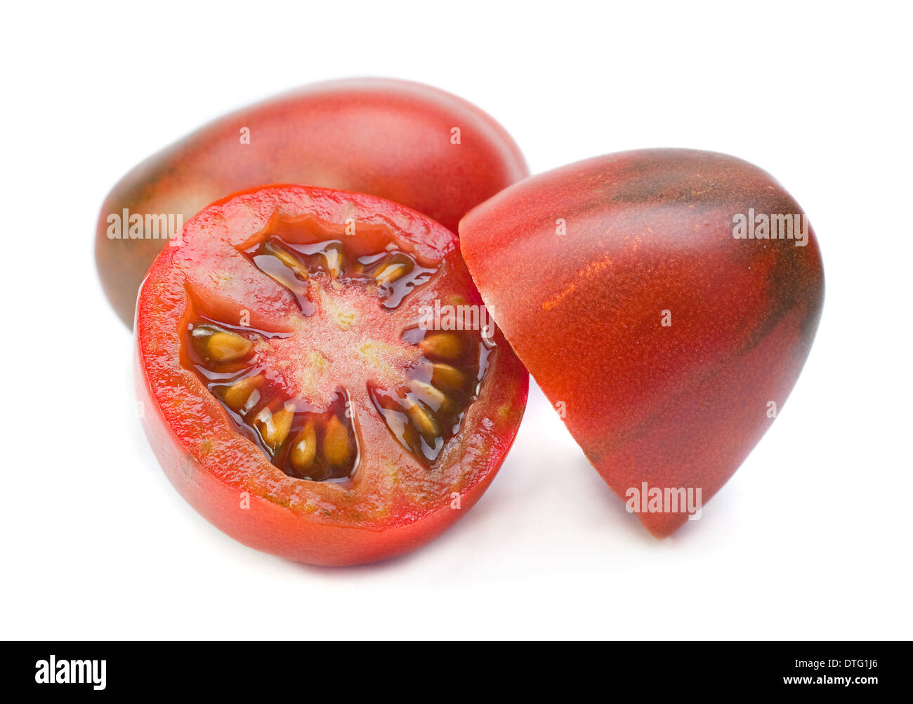 Rosso Pomodoro ciliegino closeup su bianco Foto Stock