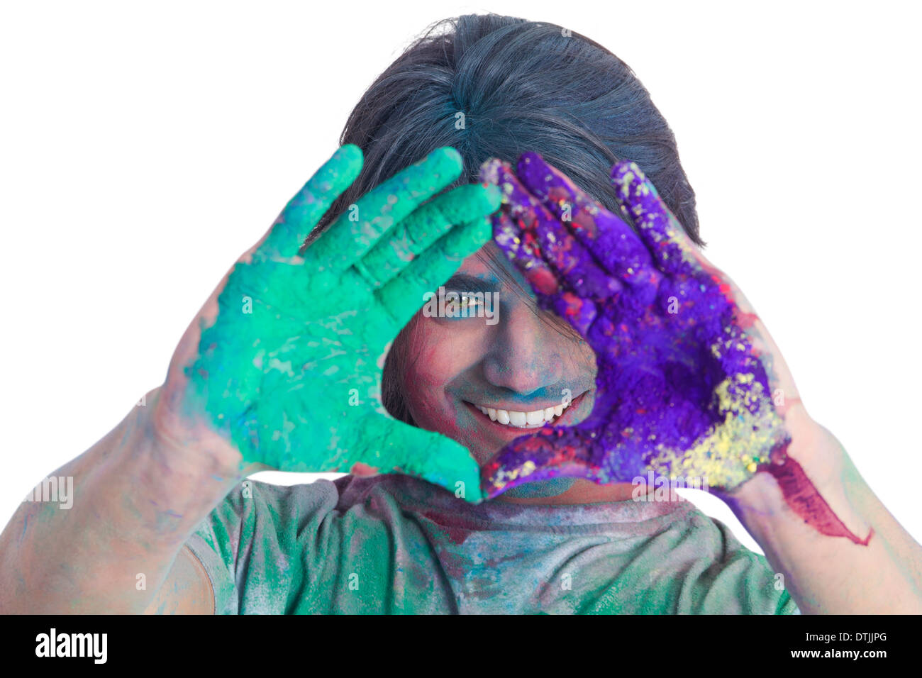 Uomo che mostra le loro mani colorate celebrare Holi Foto Stock