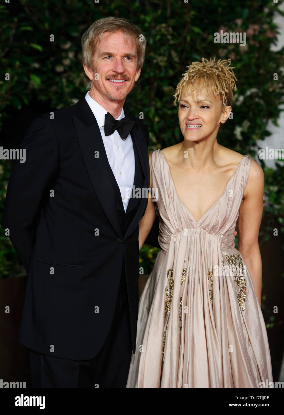 Matthew Modine e Caridad Rivera arriva per il British Academy Film Awards 2014 dopo essere partito al Grosvenor Hotel. Foto Stock