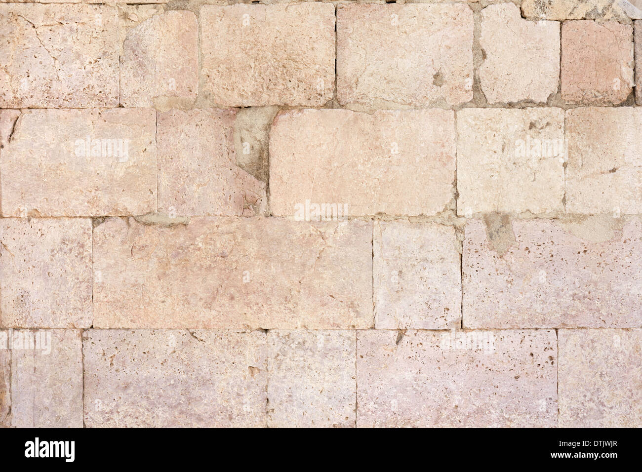 Antica pietra romana parete sfondo texture Foto Stock