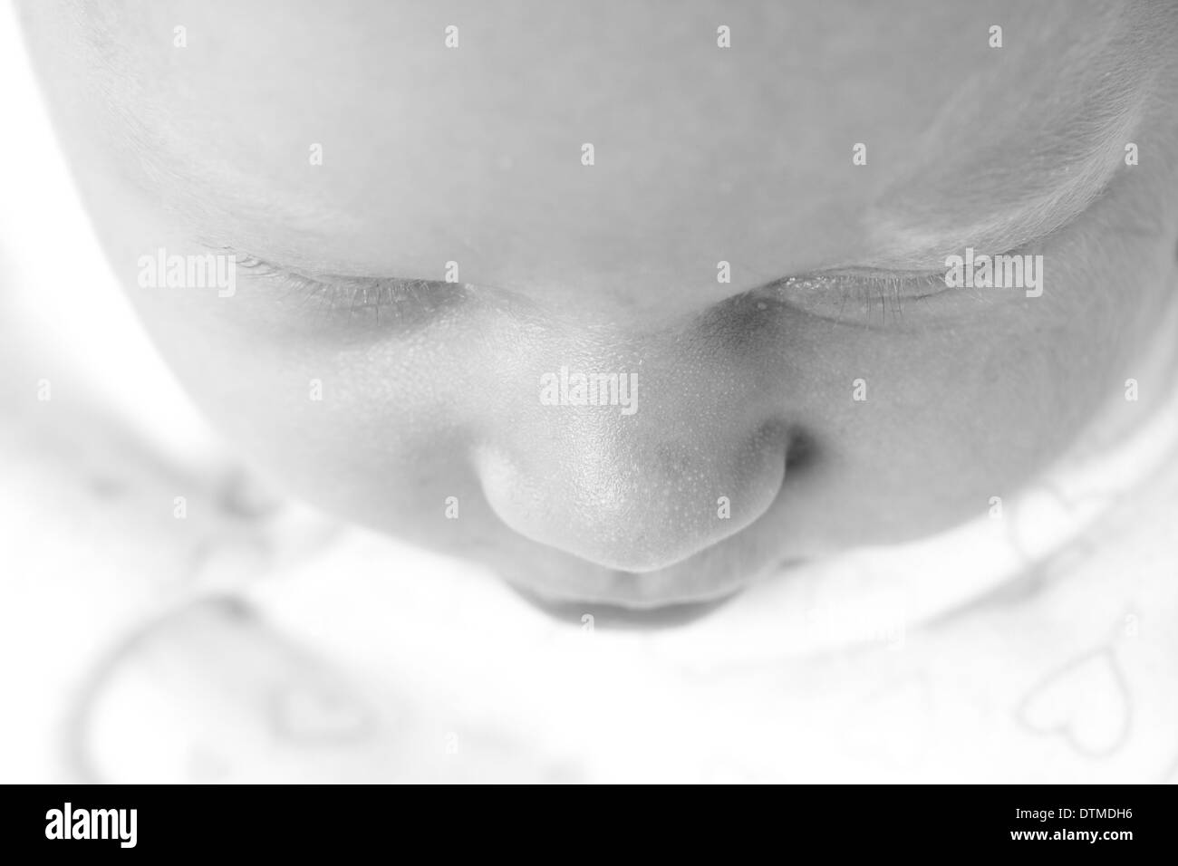 Carino sleeping neonato faccia Foto Stock