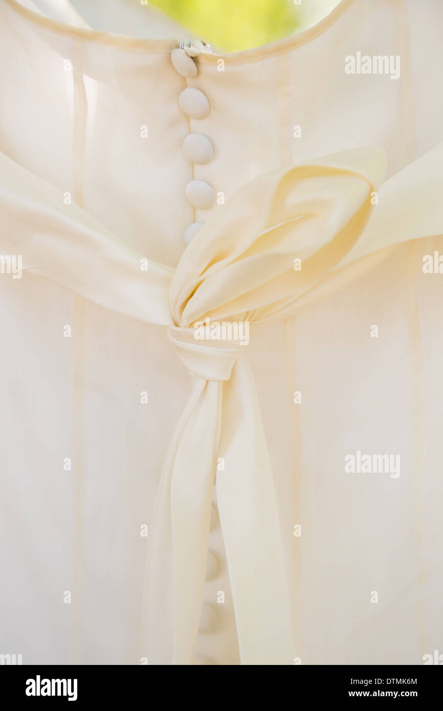 White abito da sposa dettaglio shot in un modo astratto che mostra i dettagli e la cucitura di competenze. Foto Stock
