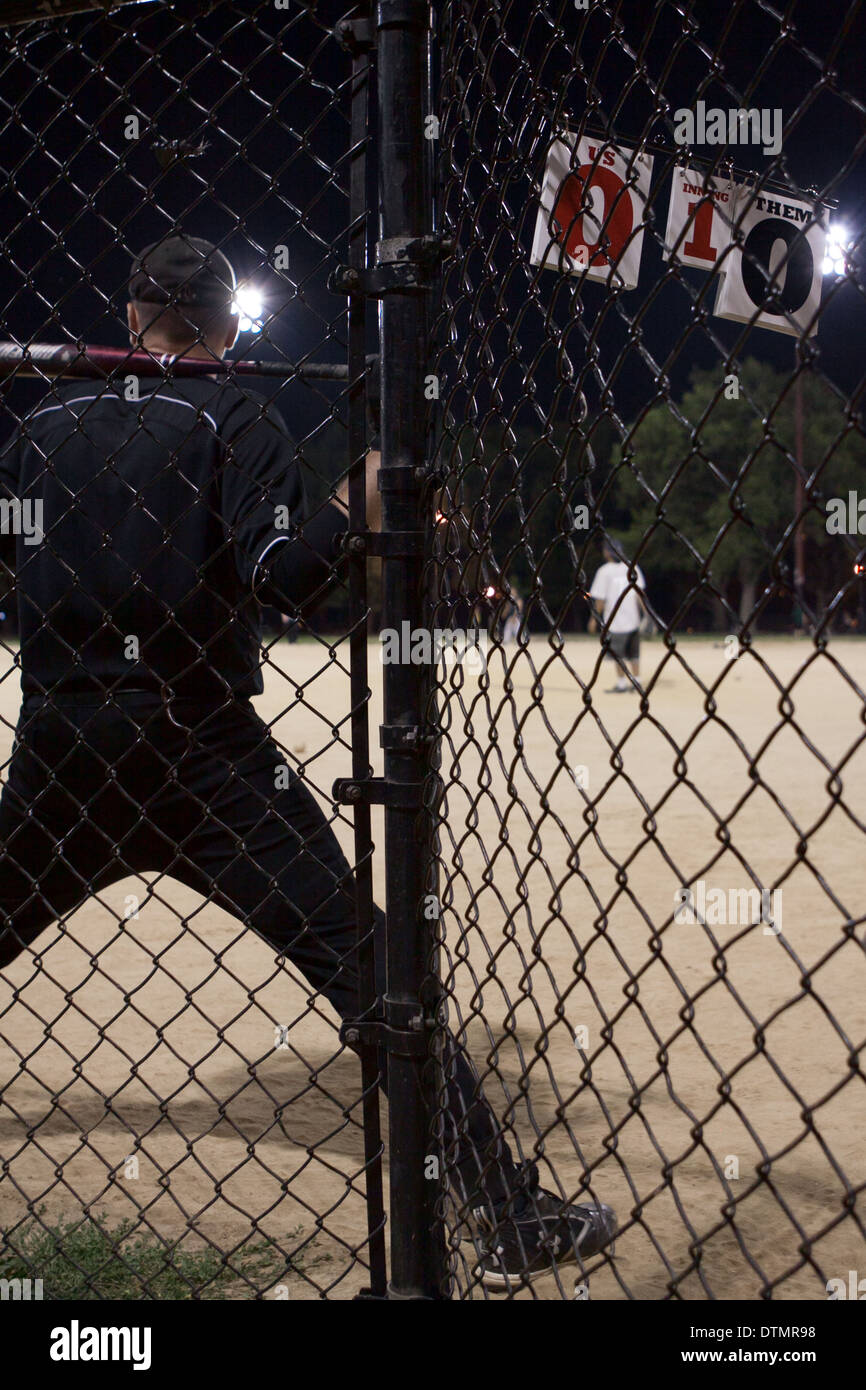 Il giocatore di baseball con bat. Foto Stock