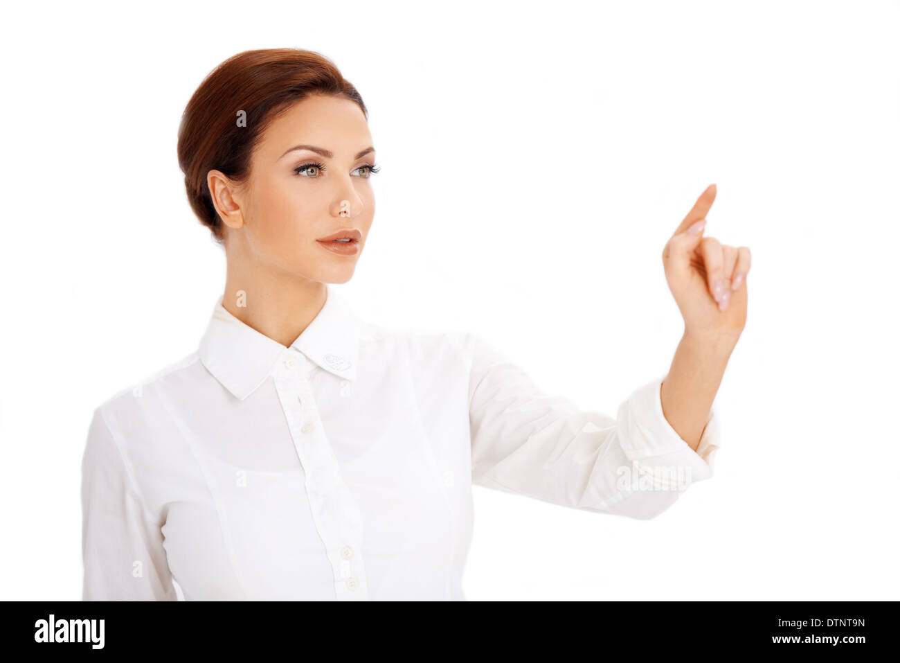 Bella donna utilizzando uno schermo virtuale Foto Stock