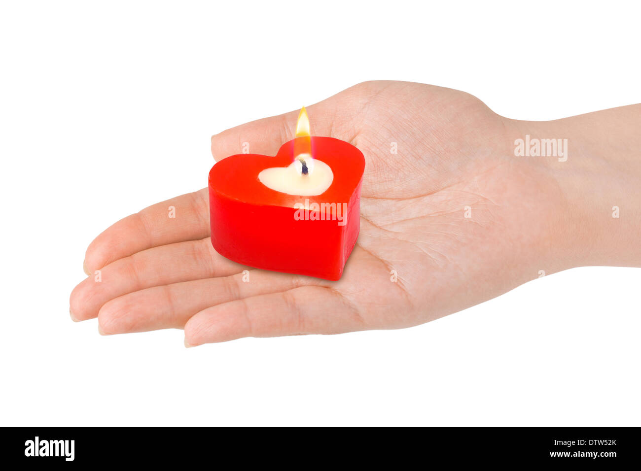 A forma di cuore ad candela in mano Foto Stock