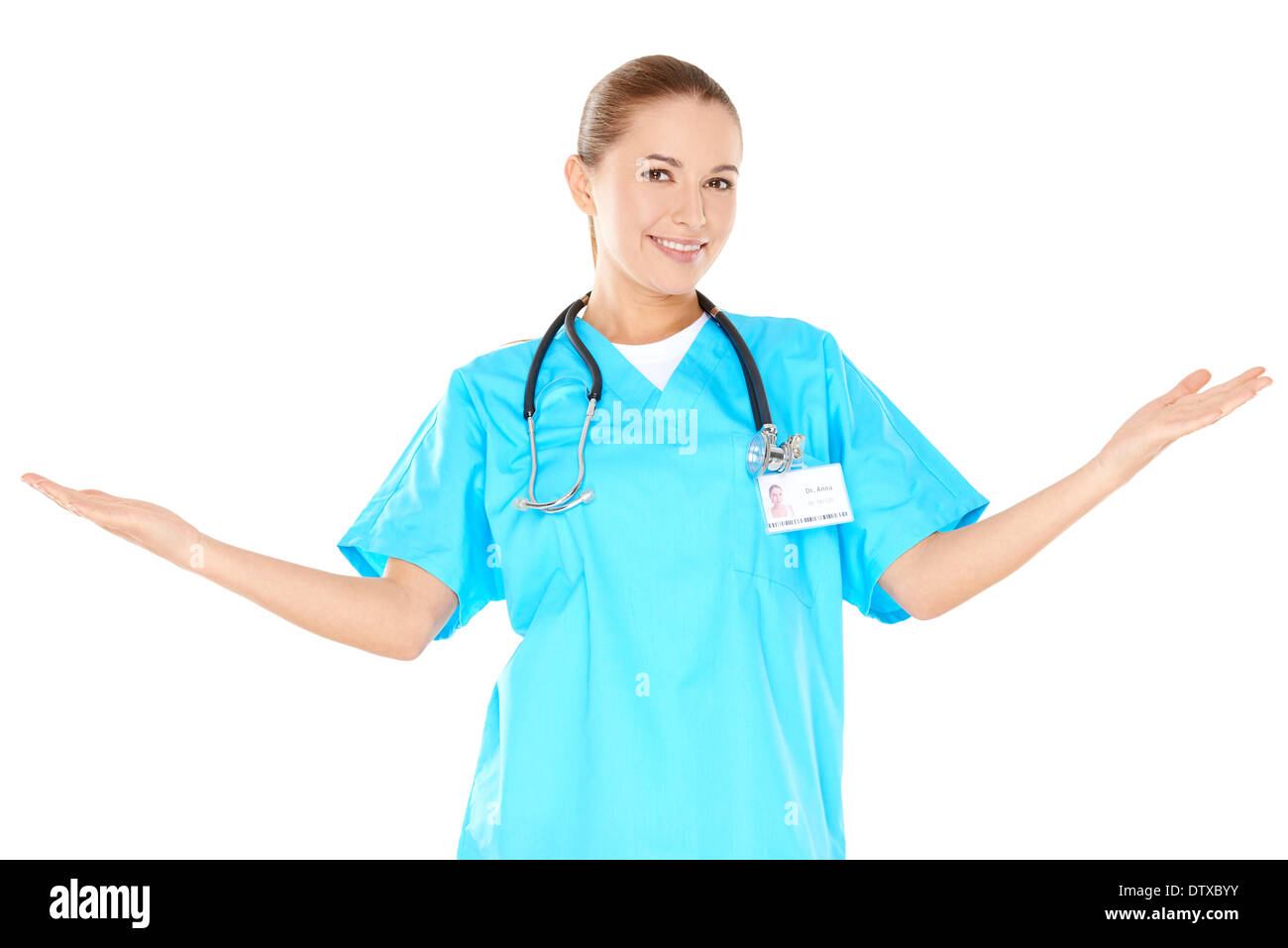 Donna sorridente medico alzando le mani Foto Stock