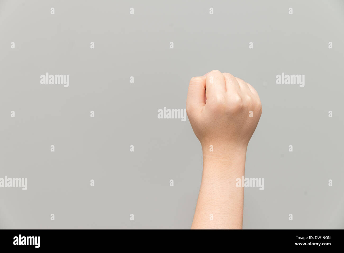 Mano con il pugno chiuso Foto Stock