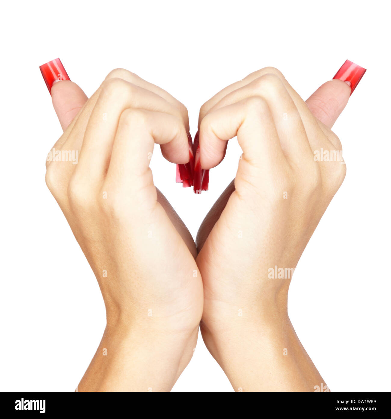 Cuore segno da mani con rosso francese unghie acriliche manicure isolato sfondo bianco Foto Stock