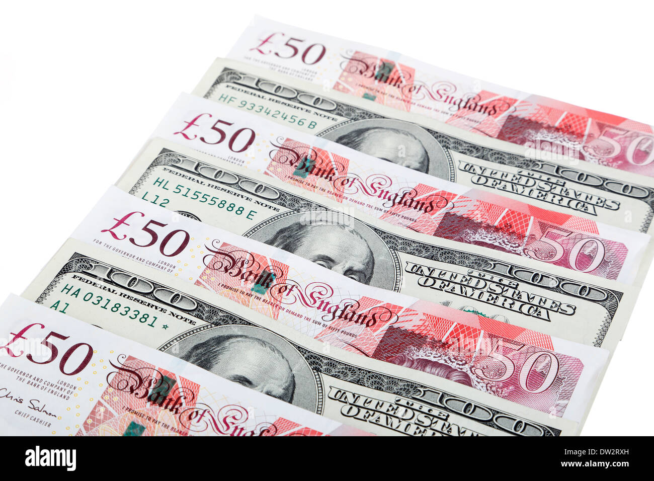 Valuta britannica e la valuta cinese su sfondo bianco Foto Stock