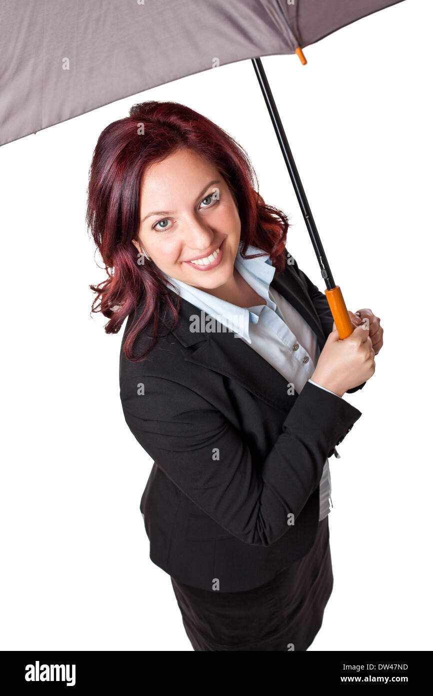 Imprenditrice sorridente con ombrello aperto Foto Stock