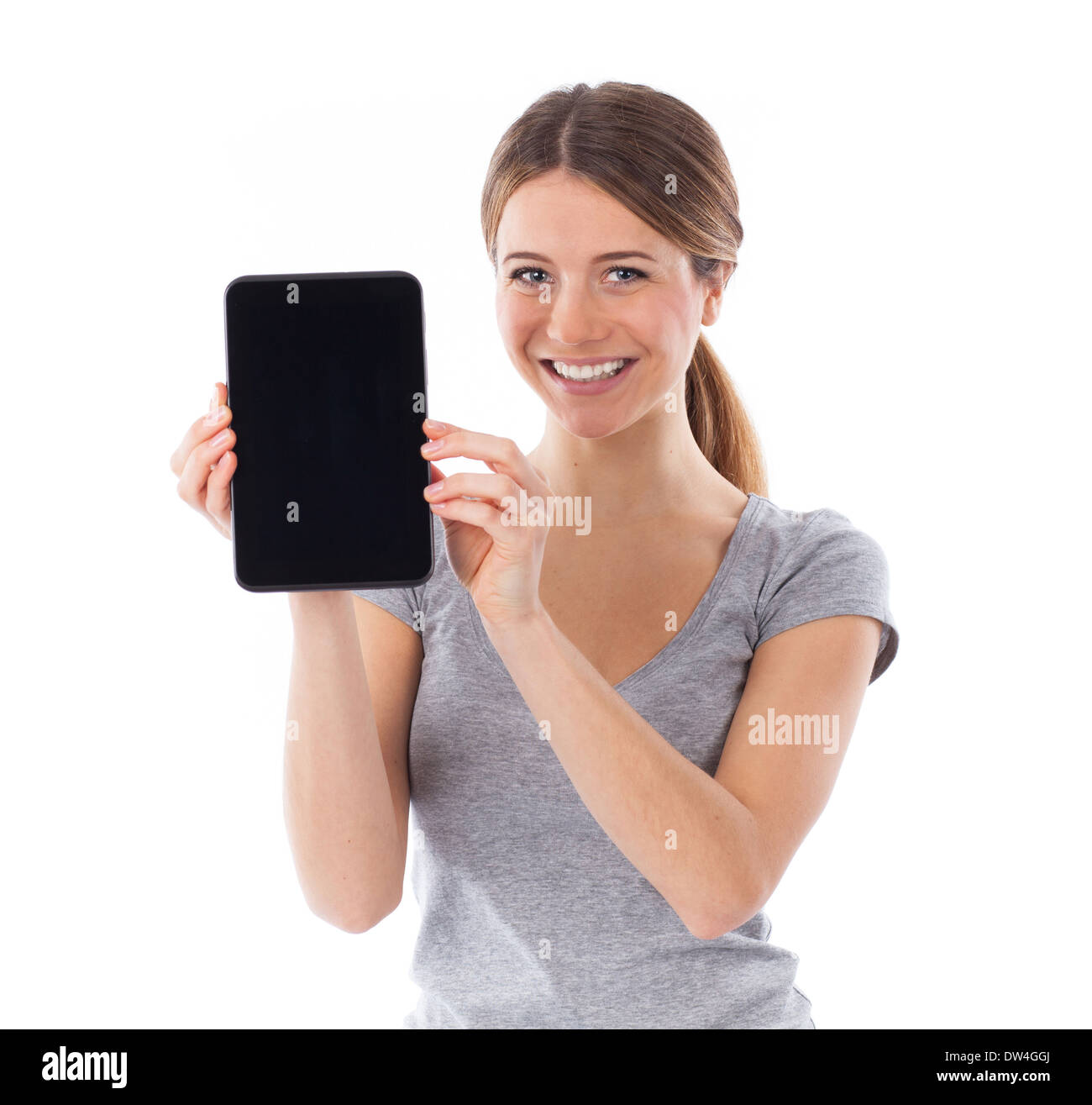 Giovane donna presentando un touchpad, il concetto di comunicazione Foto Stock
