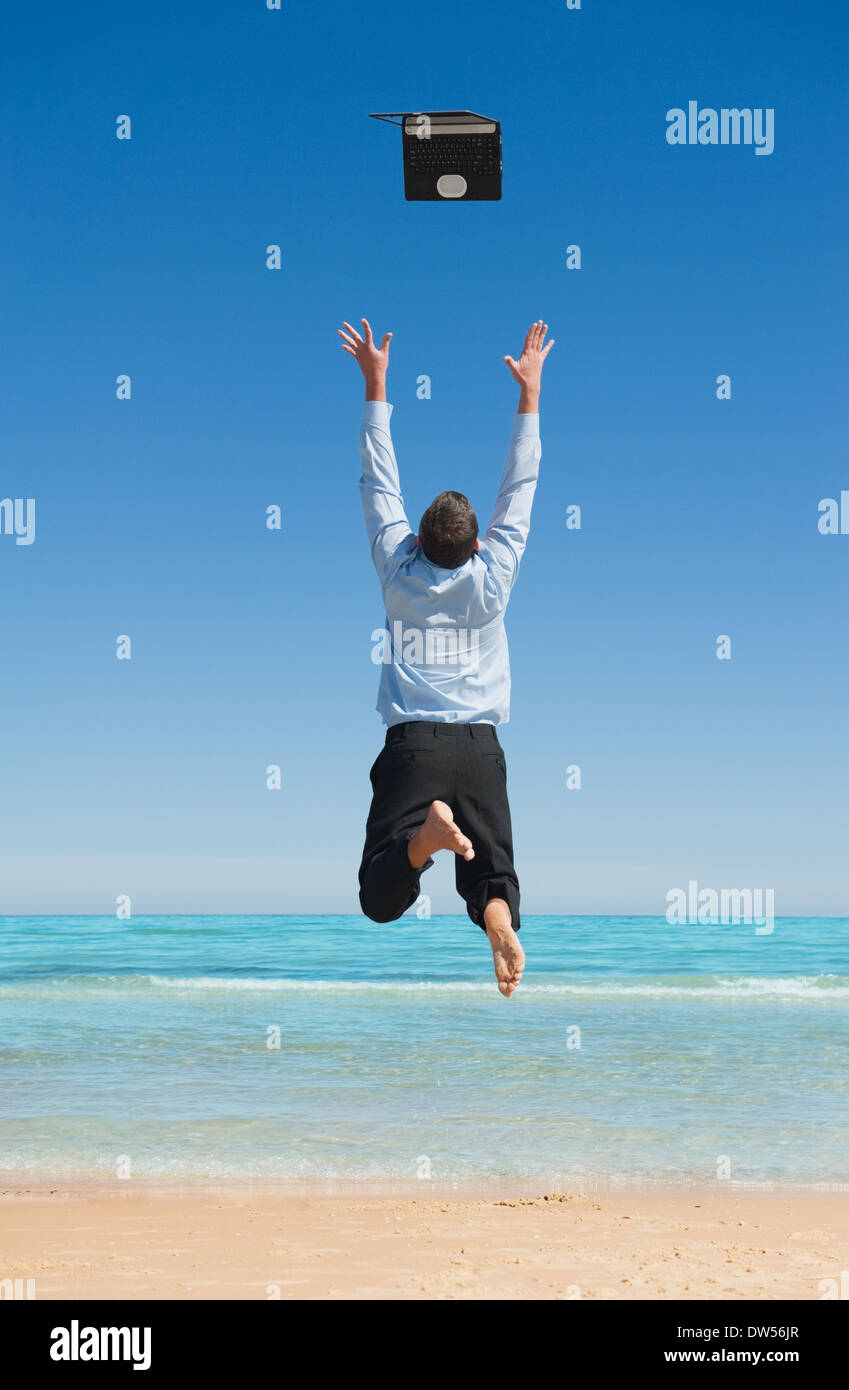 Sogni. Primo giorno di vacanza.imprenditore sulla spiaggia Foto Stock