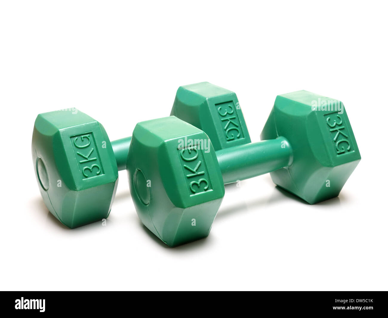 Coppia di green 3 kg manubri colpo su sfondo bianco Foto Stock