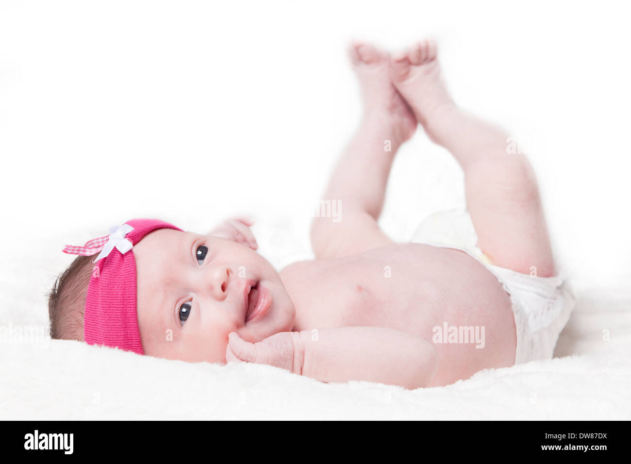 Felice neonato ragazza appena una settimana fa fotografato in studio Foto Stock