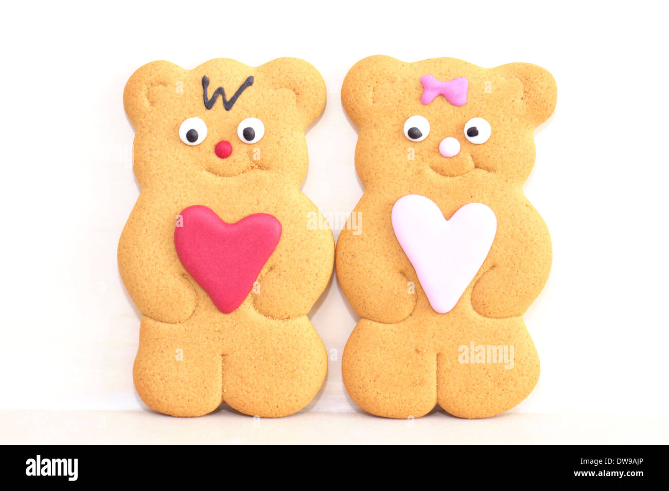 Un ragazzo e una ragazza gingerbreads Foto Stock