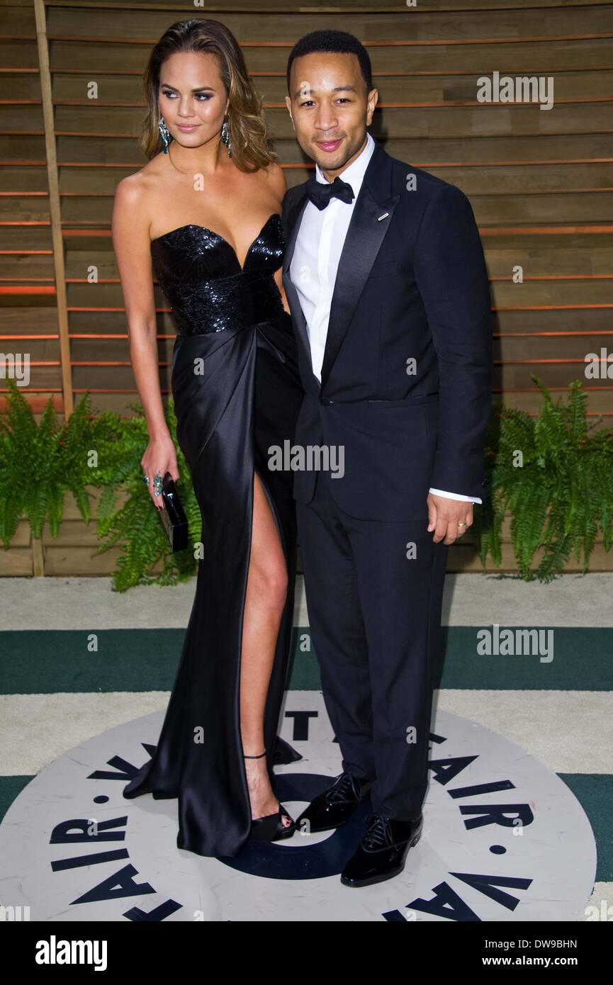 JOHN LEGEND & moglie Christine TEIGEN 2014 Vanity Fair LOS ANGELES STATI UNITI D'AMERICA 03 Marzo 2014 Foto Stock