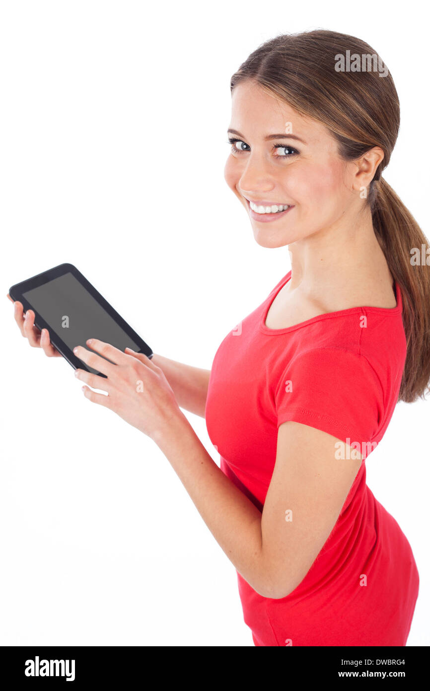Ragazza sorridente con un bianco tablet pc, il concetto di comunicazione Foto Stock