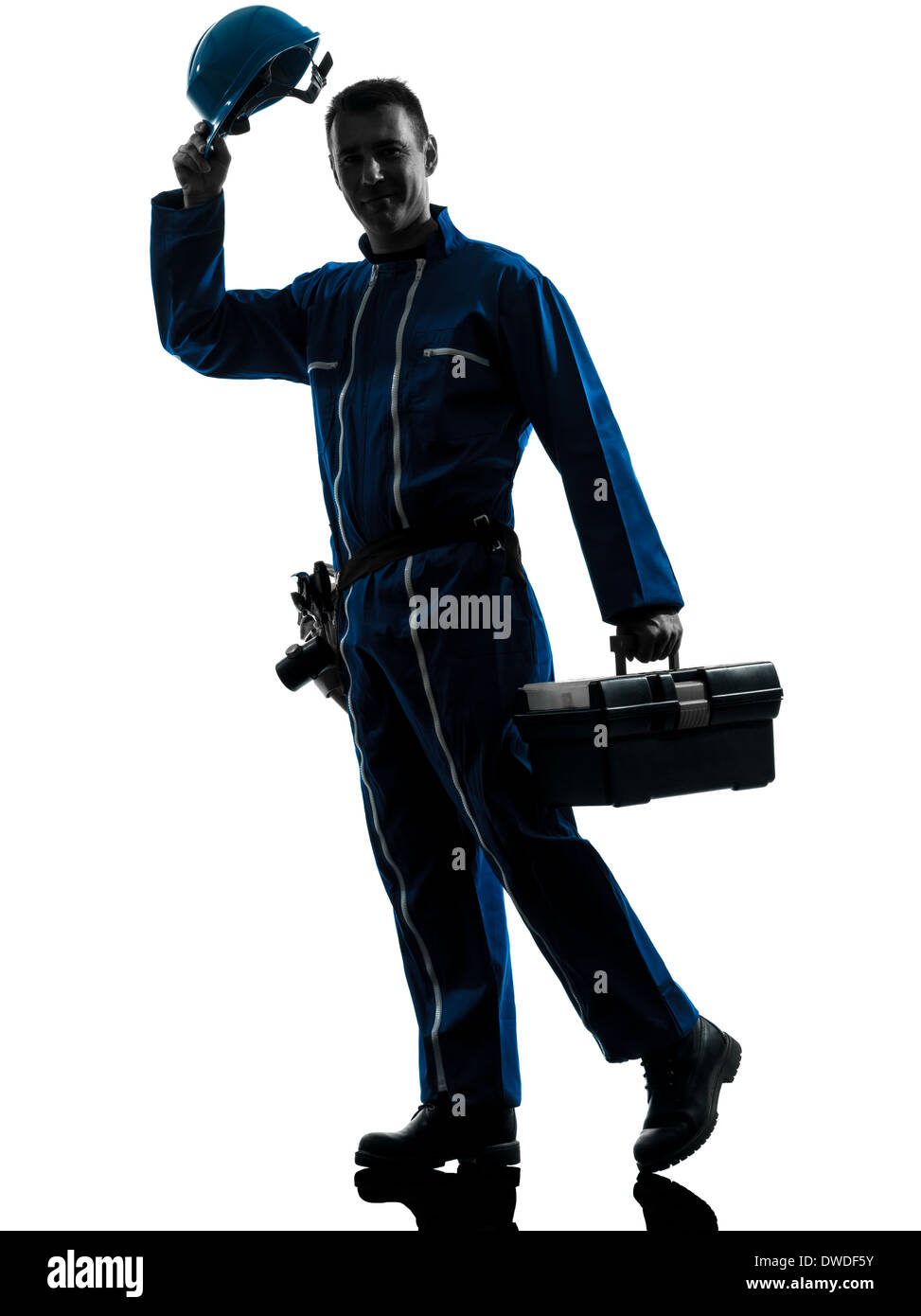 Un aggiustatore lavoratore salutando silhouette in studio su sfondo bianco Foto Stock