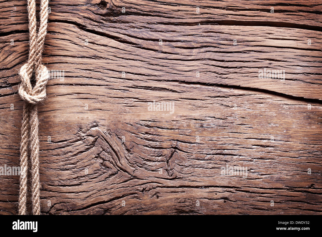 Sailor's nodo su un vecchio sfondo di legno. Foto Stock