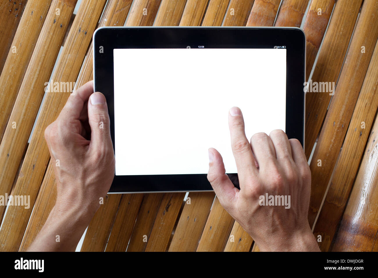 Mani tablet Foto Stock