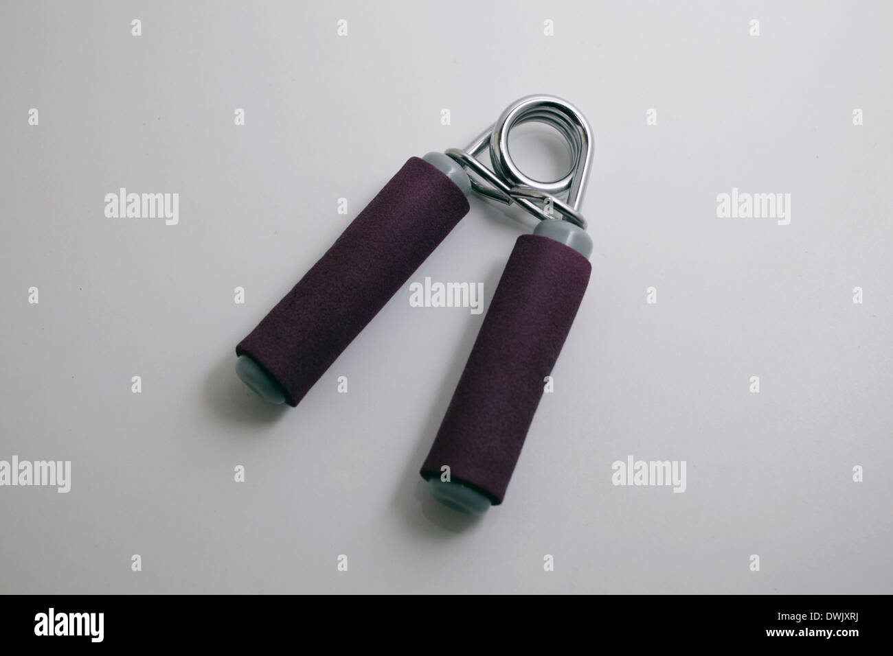 La molla la presa con la mano attrezzatura ginnica Foto Stock