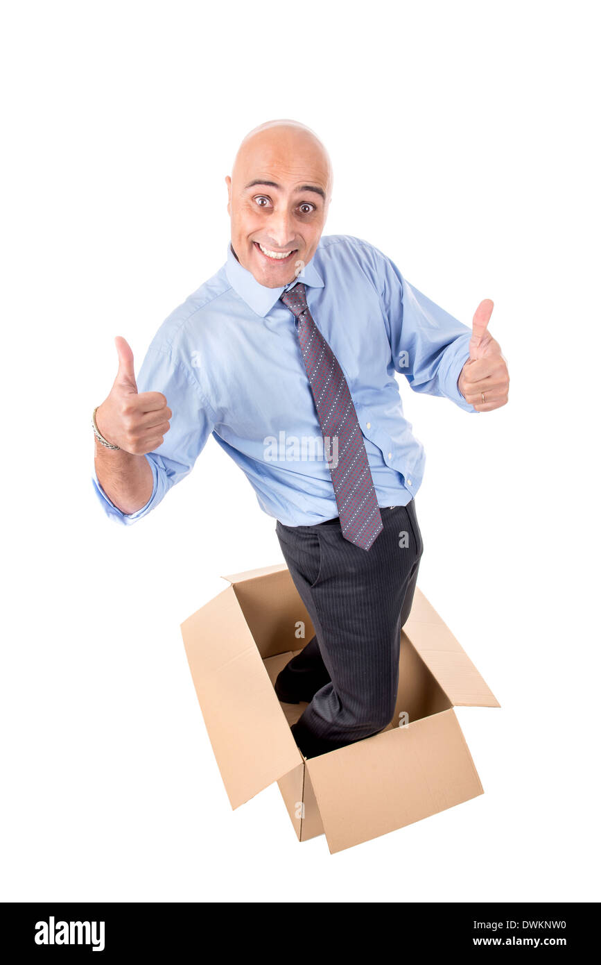 Happy businessman all'interno di una scatola di cartone Foto Stock
