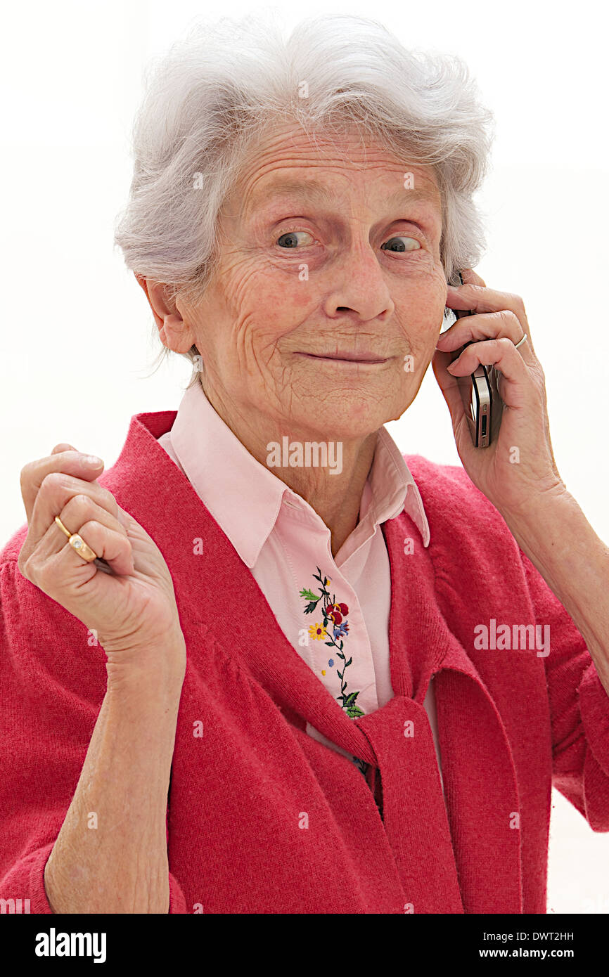 Persona anziana sul telefono Foto Stock