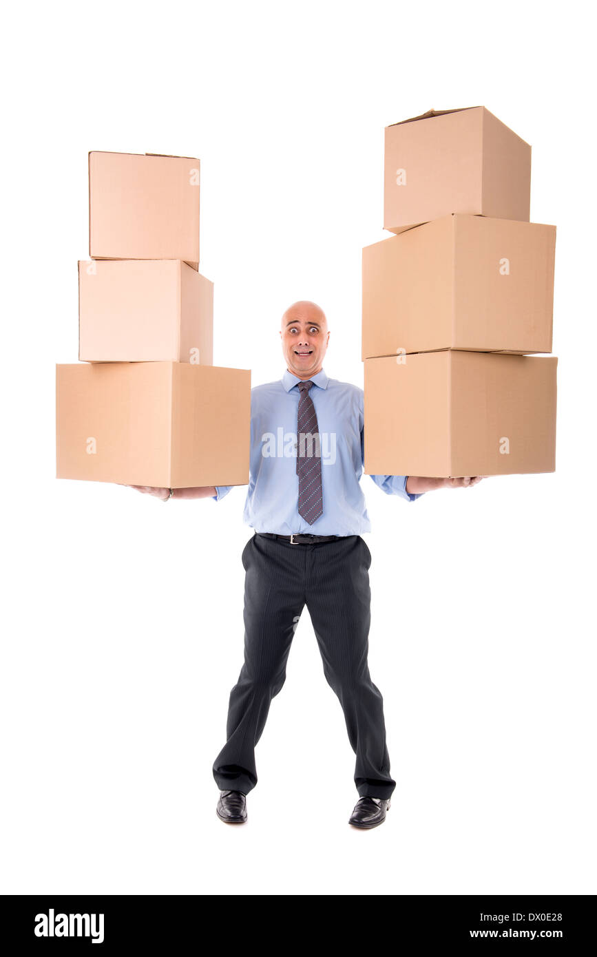 Imprenditore portare pile di scatole di cartone Foto Stock