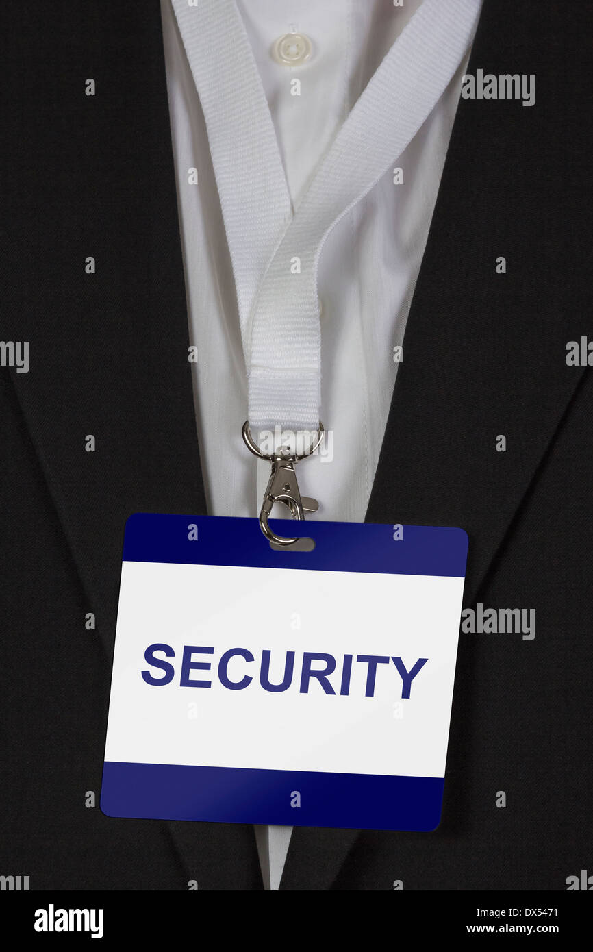 Uomo in suite indossando un pass card intorno al suo collo Foto Stock Uomo in suite indossando un pass card intorno al suo collo Foto Stock