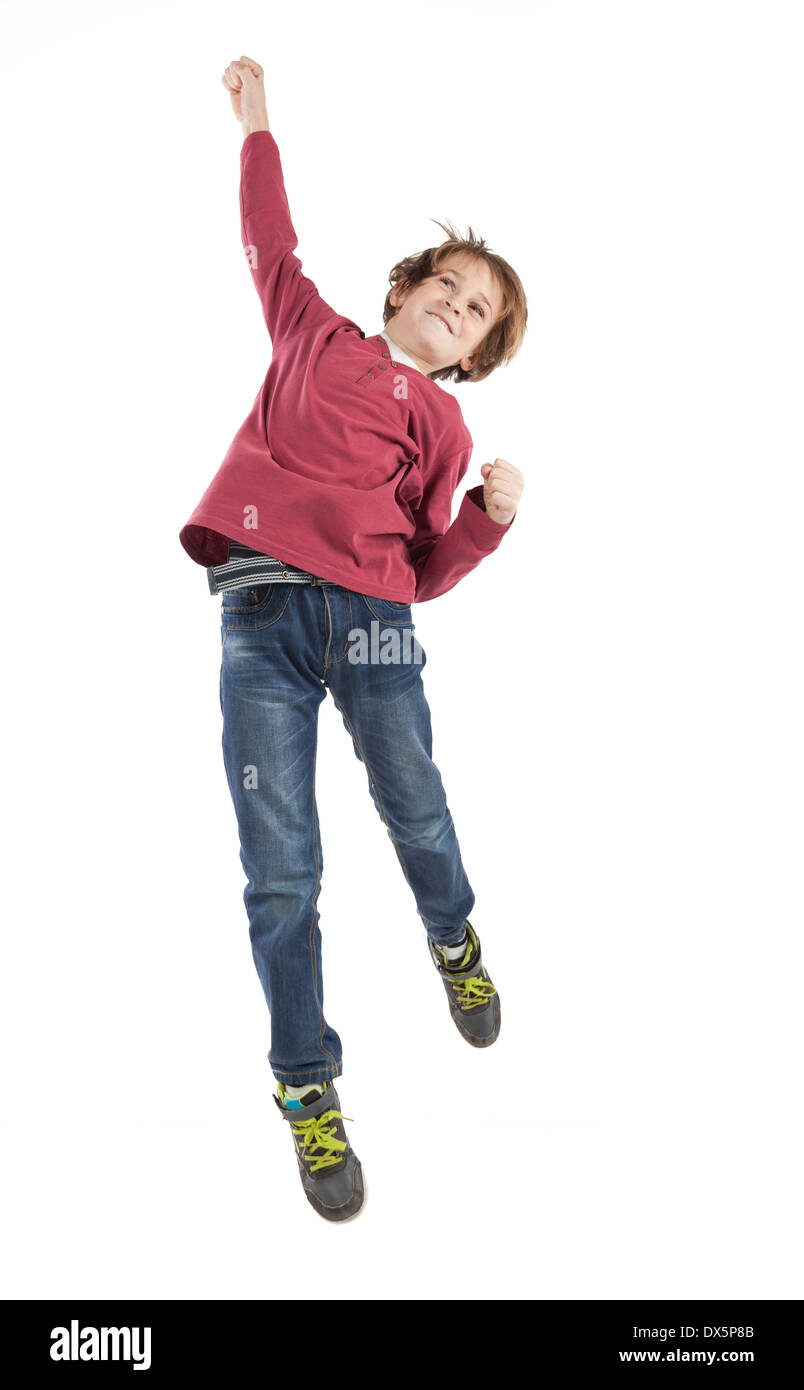 Jumping boy isolato su uno sfondo bianco Foto Stock