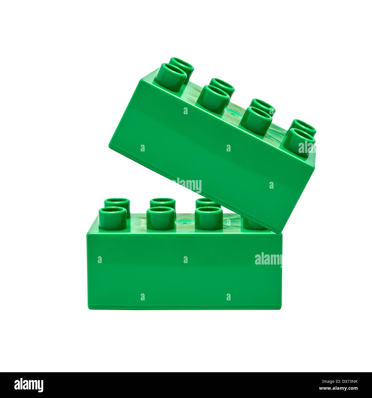 Green building block isolato su bianco Foto Stock