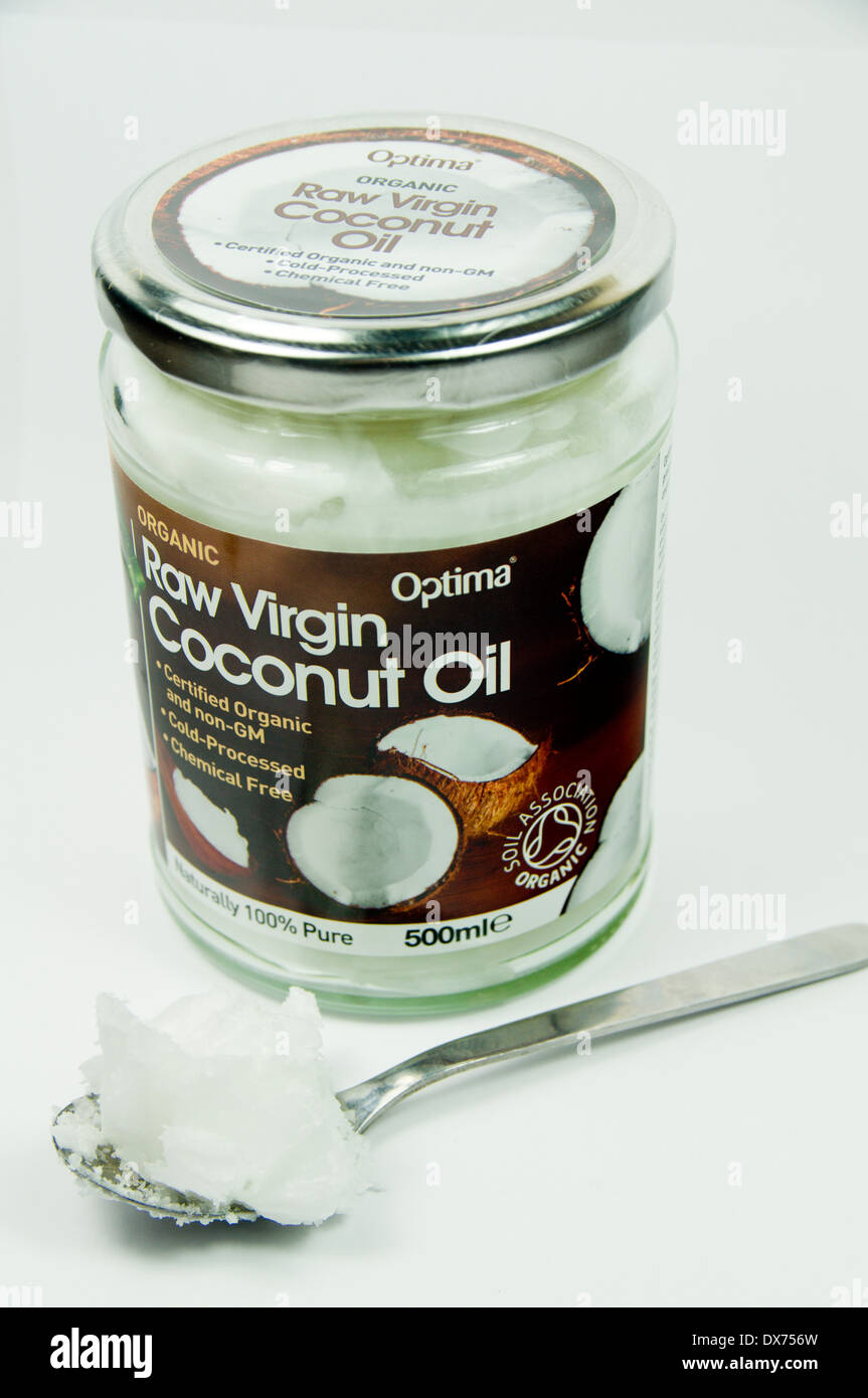 Materie vergine di olio di noce di cocco jar. Foto Stock