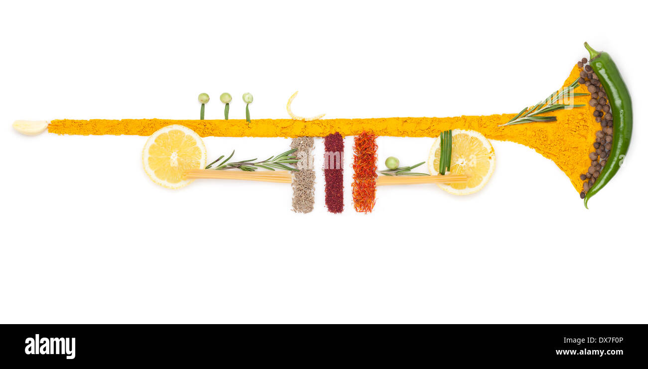 Una foto colorata della tromba fatta di frutta e verdura e spezie. Foto Stock
