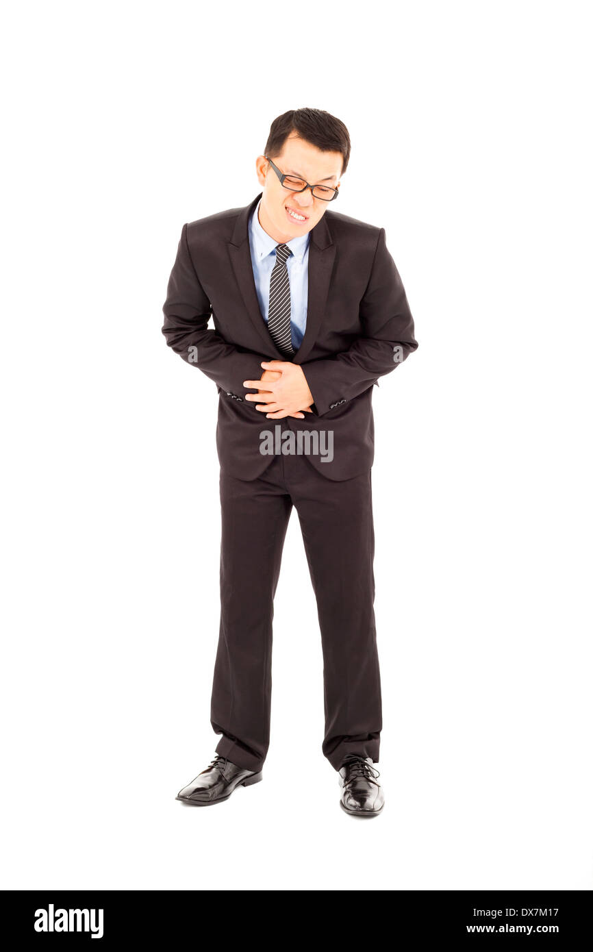 Imprenditore tenendo il suo stomaco dolore.isolati su sfondo bianco Foto Stock